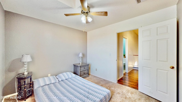 8942 N Ferber Ct, Tucson, AZ 85742 - bedroom featuring carpet floors and a ceiling fan
