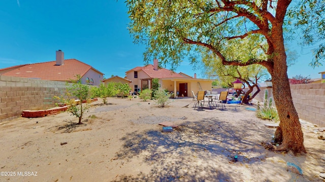8942 N Ferber Ct, Tucson, AZ 85742 - fenced backyard with a patio