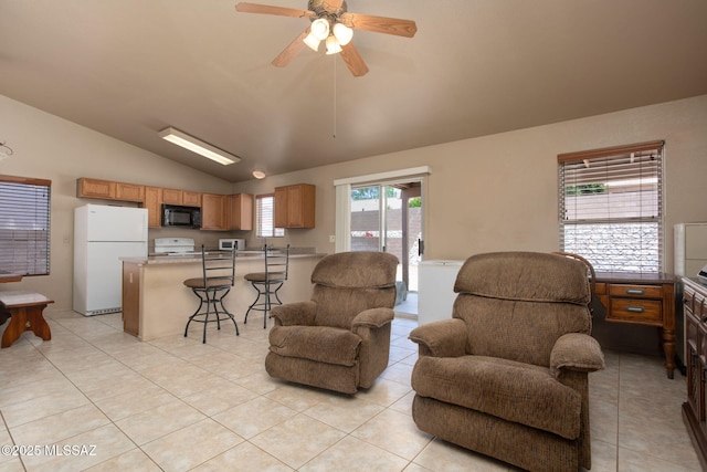 5442 W Cochie Springs St, Marana, AZ 85658 - living room featuring vaulted ceiling, light tile patterned floors, and a ceiling fan
