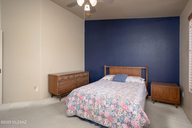 5442 W Cochie Springs St, Marana, AZ 85658 - carpeted bedroom featuring a ceiling fan and vaulted ceiling