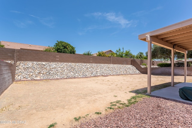 5442 W Cochie Springs St, Marana, AZ 85658 - fenced backyard with a patio