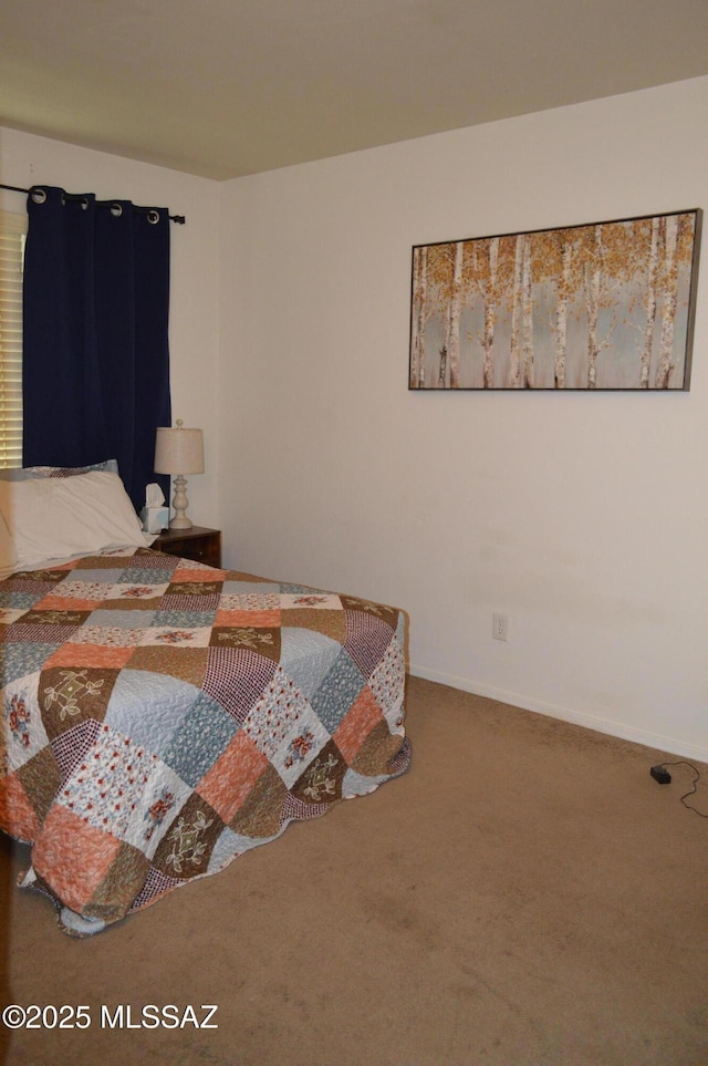 1809 E Miles St, Tucson, AZ 85719 - carpeted bedroom with baseboards