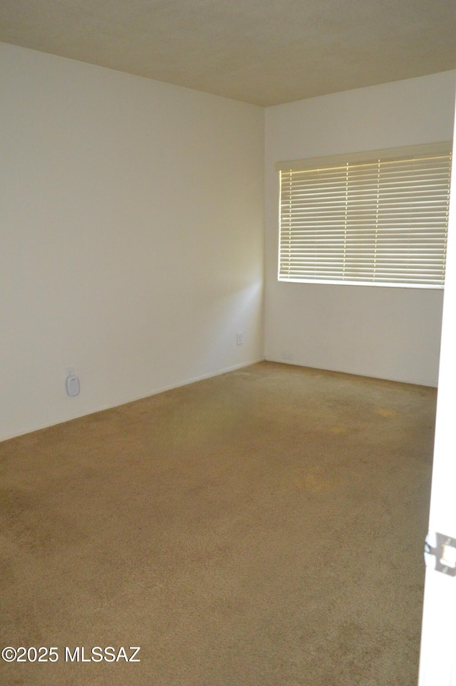 1809 E Miles St, Tucson, AZ 85719 - view of carpeted empty room
