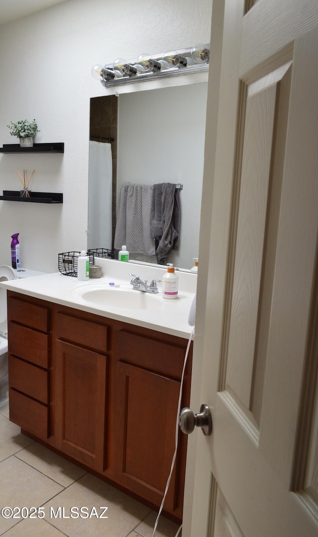 1809 E Miles St, Tucson, AZ 85719 - bathroom featuring vanity and tile patterned flooring
