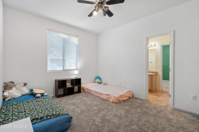 11120 E Mountain Gate Pl, Tucson, AZ 85749 - bedroom with carpet flooring, connected bathroom, and ceiling fan
