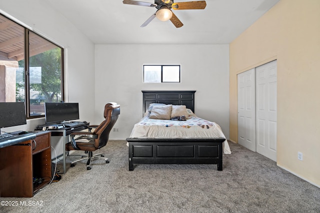 11120 E Mountain Gate Pl, Tucson, AZ 85749 - carpeted bedroom featuring multiple windows, an office area, a ceiling fan, and a closet