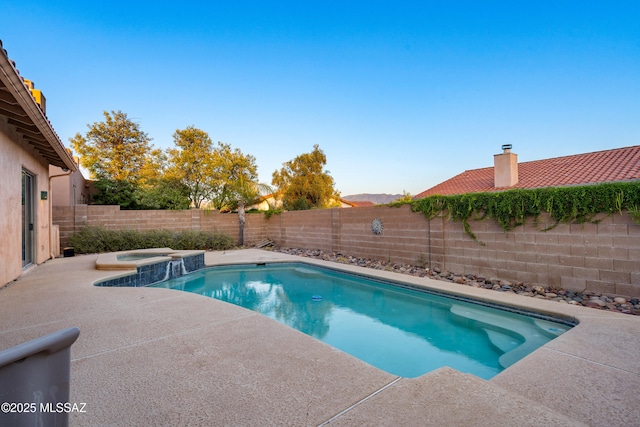 11120 E Mountain Gate Pl, Tucson, AZ 85749 - view of pool with a fenced backyard, a patio area, and a pool with connected hot tub