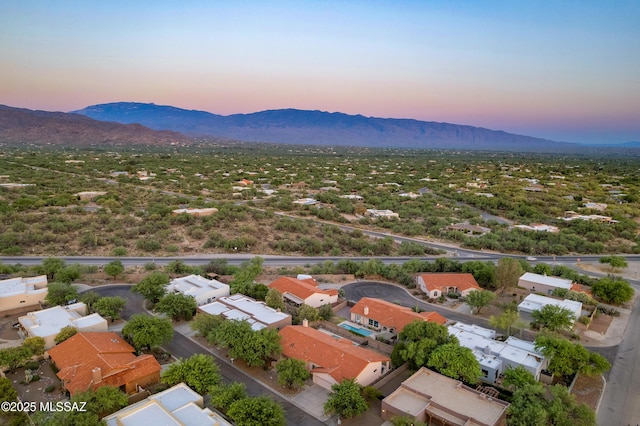 11120 E Mountain Gate Pl, Tucson, AZ 85749 - aerial view at dusk of a mountain view and a residential view