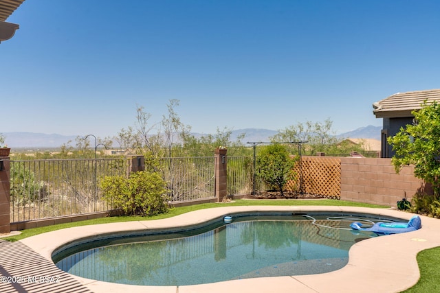 9407 E Greek Sage Way, Vail, AZ 85641 - view of swimming pool featuring a mountain view