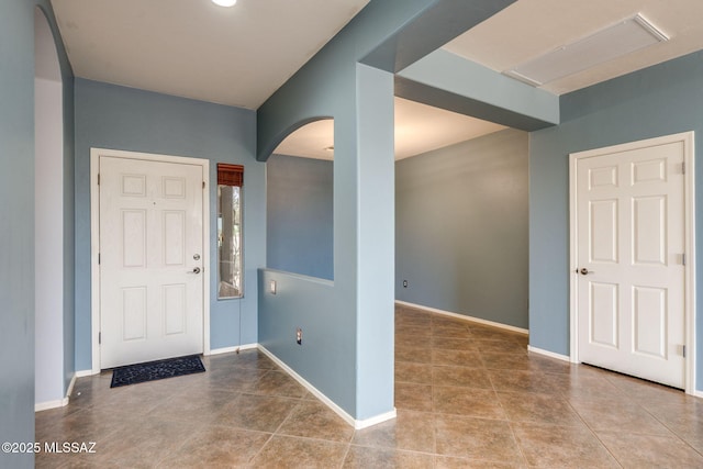 9407 E Greek Sage Way, Vail, AZ 85641 - tiled entryway with arched walkways and baseboards