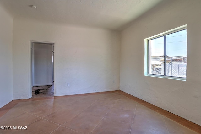 1125 W Huron St, Tucson, AZ 85745 - view of tiled spare room