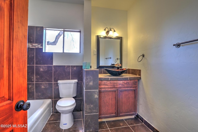 1125 W Huron St, Tucson, AZ 85745 - bathroom with tile patterned flooring and vanity