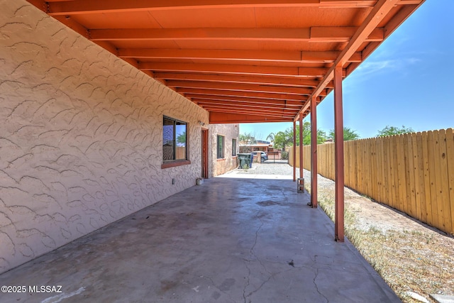 1125 W Huron St, Tucson, AZ 85745 - fenced backyard featuring a patio area and a carport