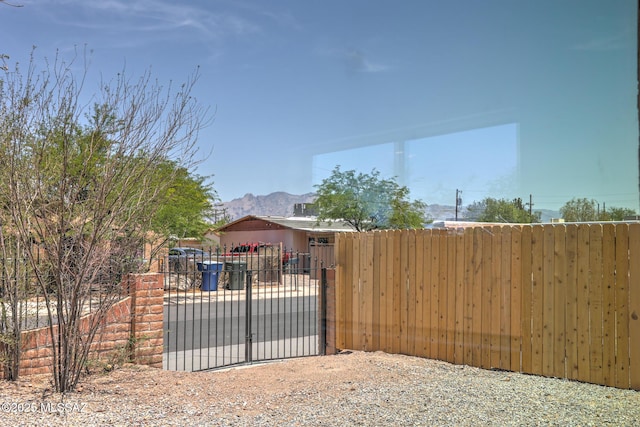 1125 W Huron St, Tucson, AZ 85745 - gate featuring a mountain view