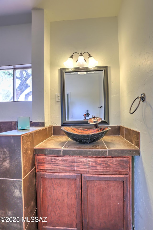 1125 W Huron St, Tucson, AZ 85745 - bathroom with vanity and a textured wall