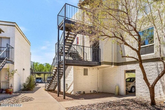 8450 E Old Spanish Trl Unit 152, Tucson, AZ 85710 - view of property with stairway