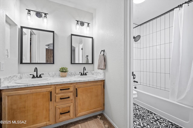 1441 N Calle De Durazo, Tucson, AZ 85715 - full bathroom featuring double vanity, shower / bath combo with shower curtain, and a textured wall