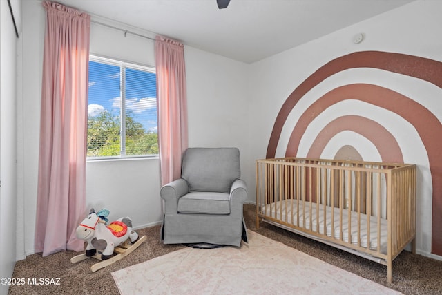 1441 N Calle De Durazo, Tucson, AZ 85715 - bedroom featuring a crib and carpet floors