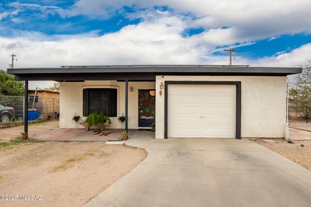 801 W Idaho St, Tucson, AZ 85706 - single story home featuring stucco siding, driveway, and a garage