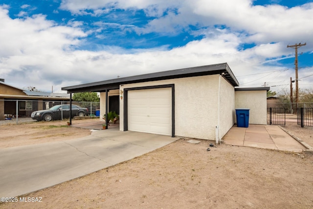 801 W Idaho St, Tucson, AZ 85706 - garage featuring concrete driveway