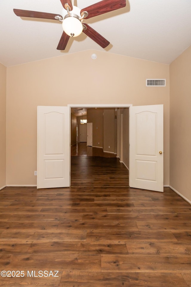 5566 W Dove Of Peace Dr, Marana, AZ 85658 - unfurnished room featuring vaulted ceiling, ceiling fan, and dark wood-style floors