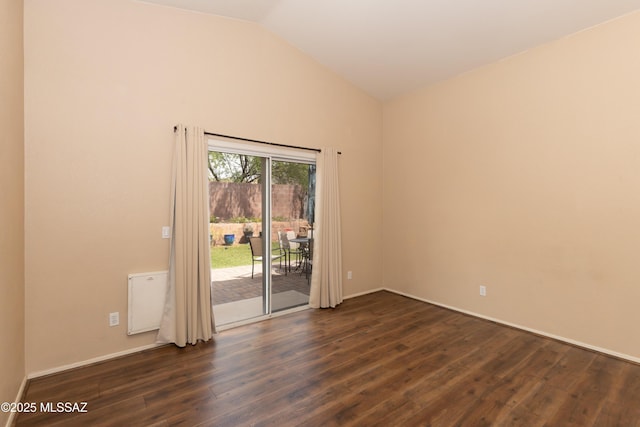 5566 W Dove Of Peace Dr, Marana, AZ 85658 - spare room with dark wood finished floors and high vaulted ceiling