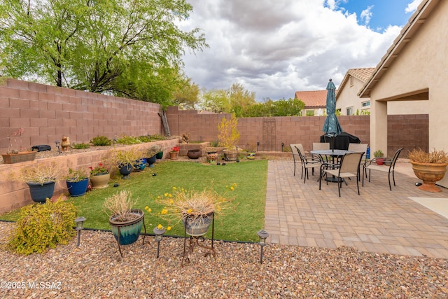 5566 W Dove Of Peace Dr, Marana, AZ 85658 - fenced backyard with a patio area