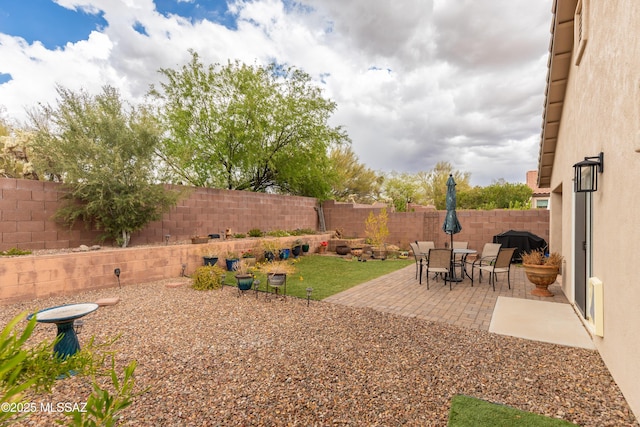 5566 W Dove Of Peace Dr, Marana, AZ 85658 - fenced backyard with a patio