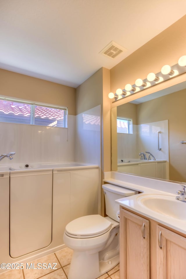 13491 N Tom Ryans Way, Oro Valley, AZ 85755 - full bath with a garden tub, vanity, and tile patterned floors