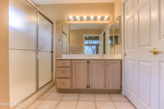 13491 N Tom Ryans Way, Oro Valley, AZ 85755 - full bathroom featuring vanity, tile patterned flooring, and a stall shower