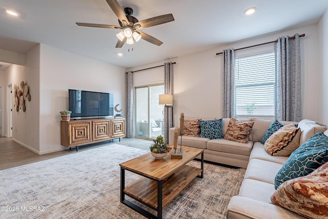 10490 W Beaman Ln, Marana, AZ 85653 - living room featuring ceiling fan, wood finished floors, and recessed lighting