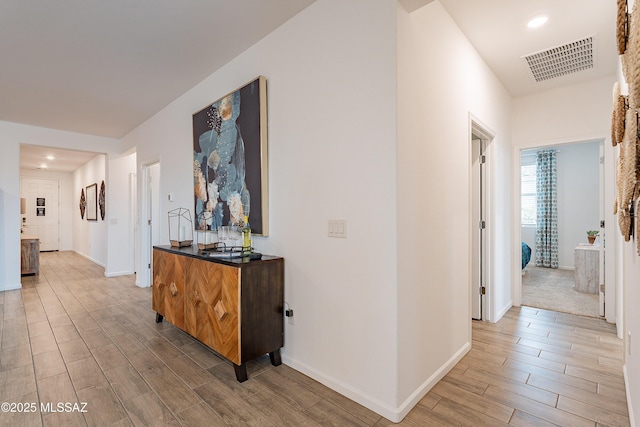 10490 W Beaman Ln, Marana, AZ 85653 - corridor featuring light wood finished floors and recessed lighting