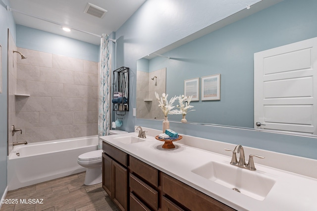 10490 W Beaman Ln, Marana, AZ 85653 - full bathroom with shower / bath combination with curtain, double vanity, and wood finished floors