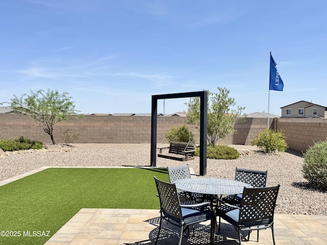 10490 W Beaman Ln, Marana, AZ 85653 - fenced backyard with a patio area and outdoor dining space