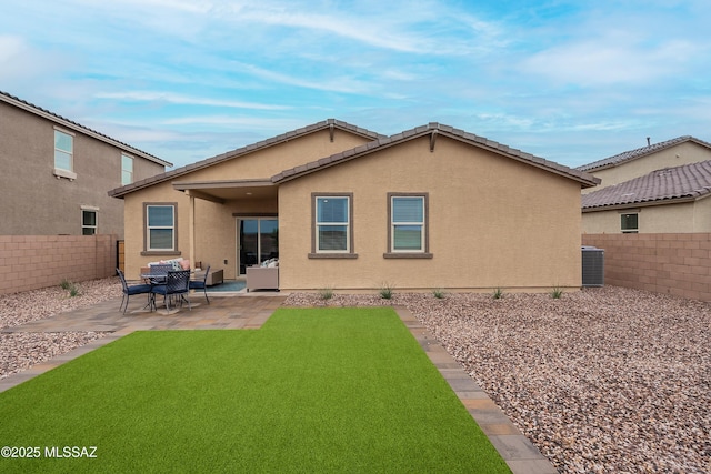 10490 W Beaman Ln, Marana, AZ 85653 - rear view of property featuring a fenced backyard, a patio area, and stucco siding