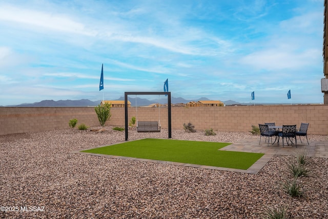 10490 W Beaman Ln, Marana, AZ 85653 - fenced backyard featuring a patio and a mountain view