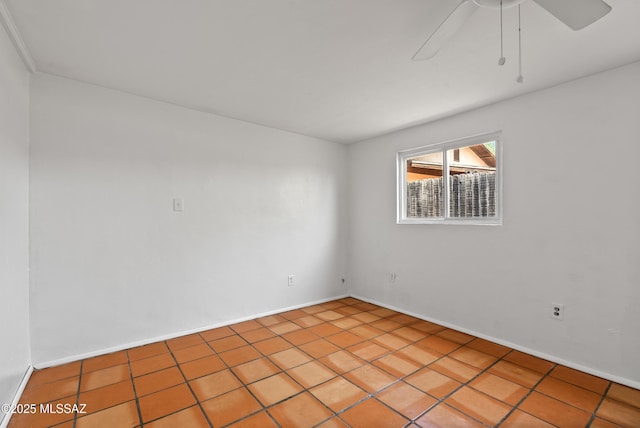 4812 E 3rd St, Tucson, AZ 85711 - spare room with light tile patterned floors and a ceiling fan