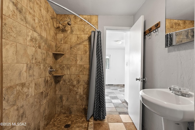 4812 E 3rd St, Tucson, AZ 85711 - full bath featuring tiled shower and tile patterned flooring