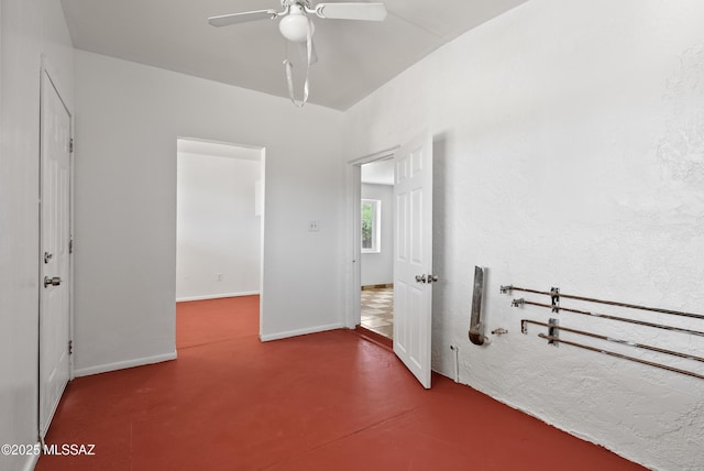 4812 E 3rd St, Tucson, AZ 85711 - hallway featuring baseboards and finished concrete flooring