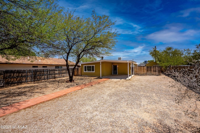 4812 E 3rd St, Tucson, AZ 85711 - back of property with a patio area