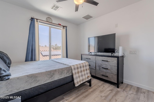 10567 E Desert Drifter Pl, Tucson, AZ 85747 - bedroom with light wood-style floors and ceiling fan