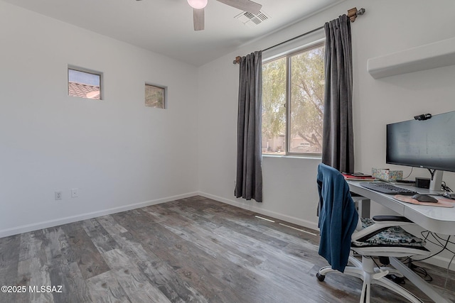 10567 E Desert Drifter Pl, Tucson, AZ 85747 - office featuring ceiling fan and wood finished floors