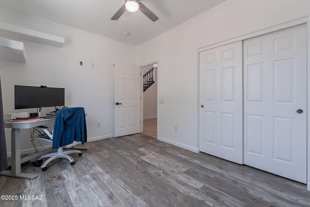10567 E Desert Drifter Pl, Tucson, AZ 85747 - office space with a ceiling fan and wood finished floors