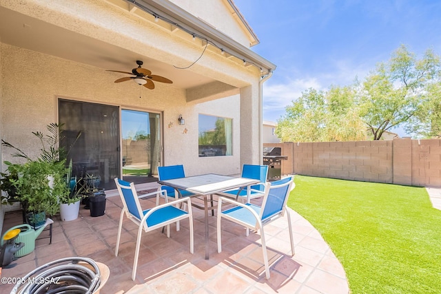 10567 E Desert Drifter Pl, Tucson, AZ 85747 - view of patio / terrace featuring a ceiling fan, outdoor dining space, and area for grilling