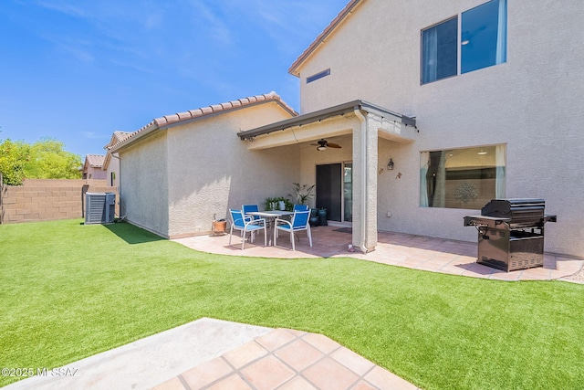10567 E Desert Drifter Pl, Tucson, AZ 85747 - back of house with a ceiling fan, a patio, and stucco siding