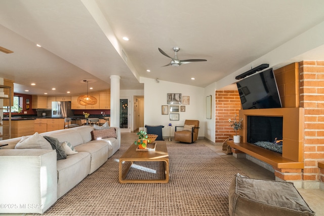 1115 W Santo Domingo Cir, Tucson, AZ 85704 - living room featuring a ceiling fan, recessed lighting, ornate columns, and vaulted ceiling