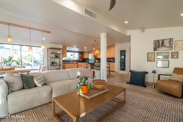 1115 W Santo Domingo Cir, Tucson, AZ 85704 - living area featuring recessed lighting and ornate columns