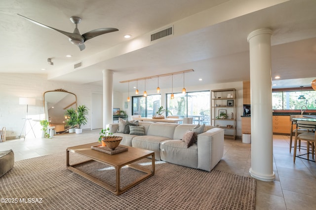 1115 W Santo Domingo Cir, Tucson, AZ 85704 - living area featuring decorative columns, light tile patterned flooring, ceiling fan, and recessed lighting