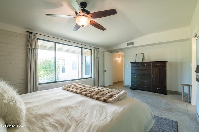 1115 W Santo Domingo Cir, Tucson, AZ 85704 - bedroom featuring lofted ceiling, a ceiling fan, and light tile patterned floors