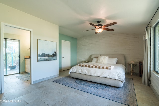 1115 W Santo Domingo Cir, Tucson, AZ 85704 - bedroom featuring multiple windows, brick wall, ceiling fan, and ensuite bath